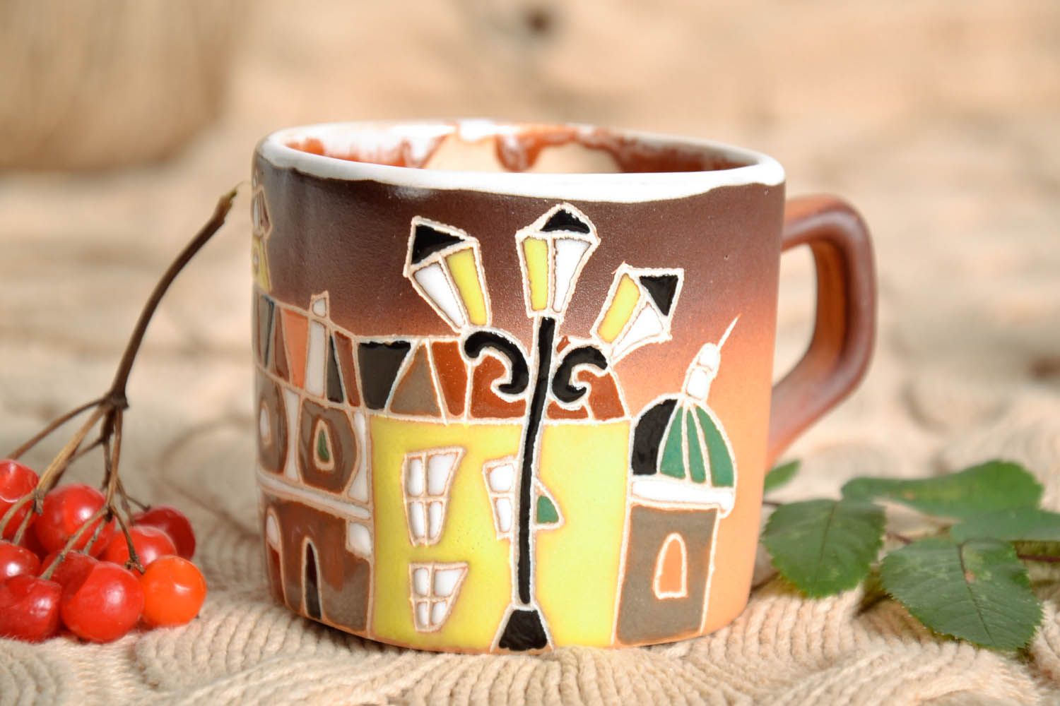 Handmade clay glazed coffee mug with little old city houses pattern photo 1
