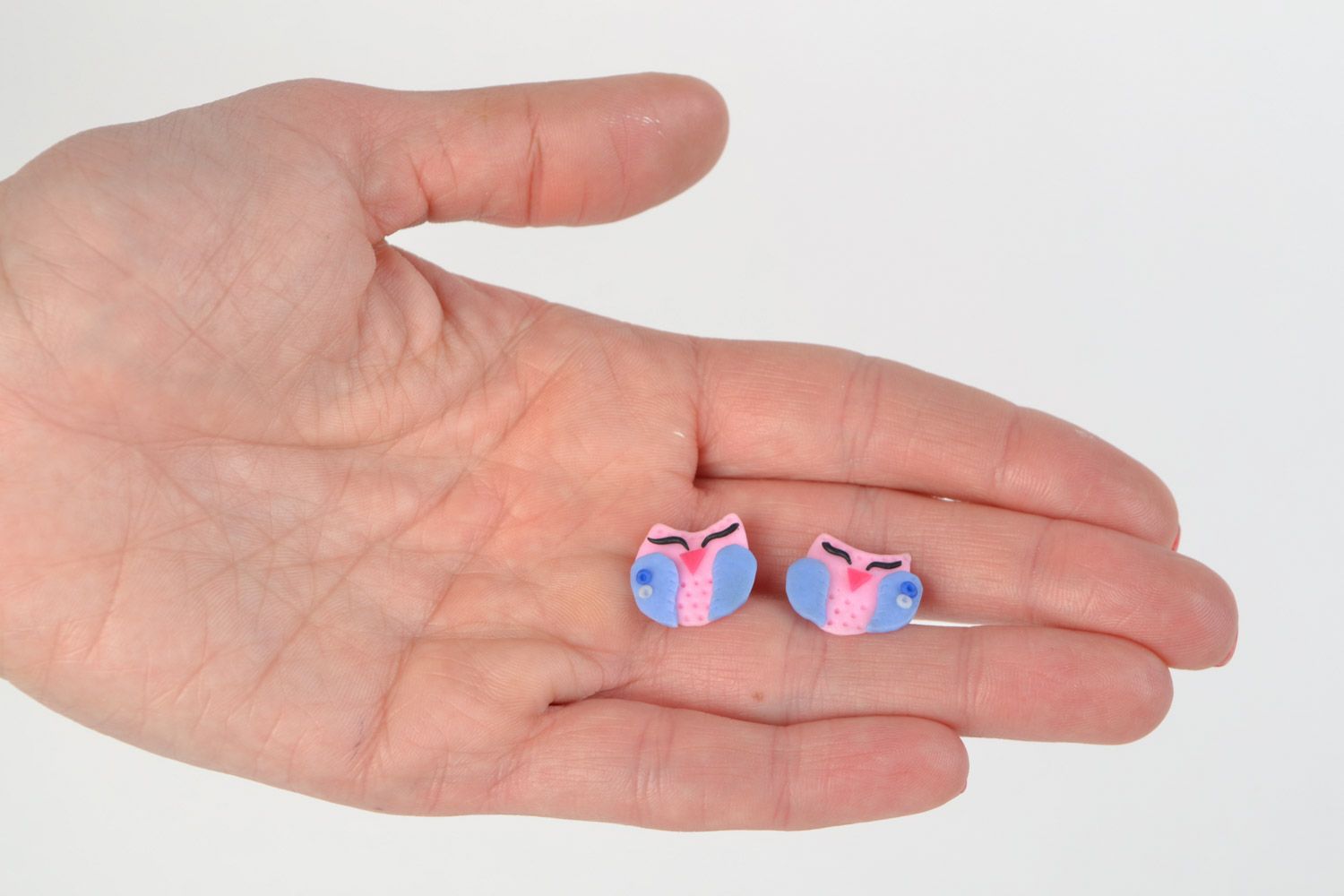 Small handmade polymer clay stud earrings in the shape of pink and blue owls photo 2