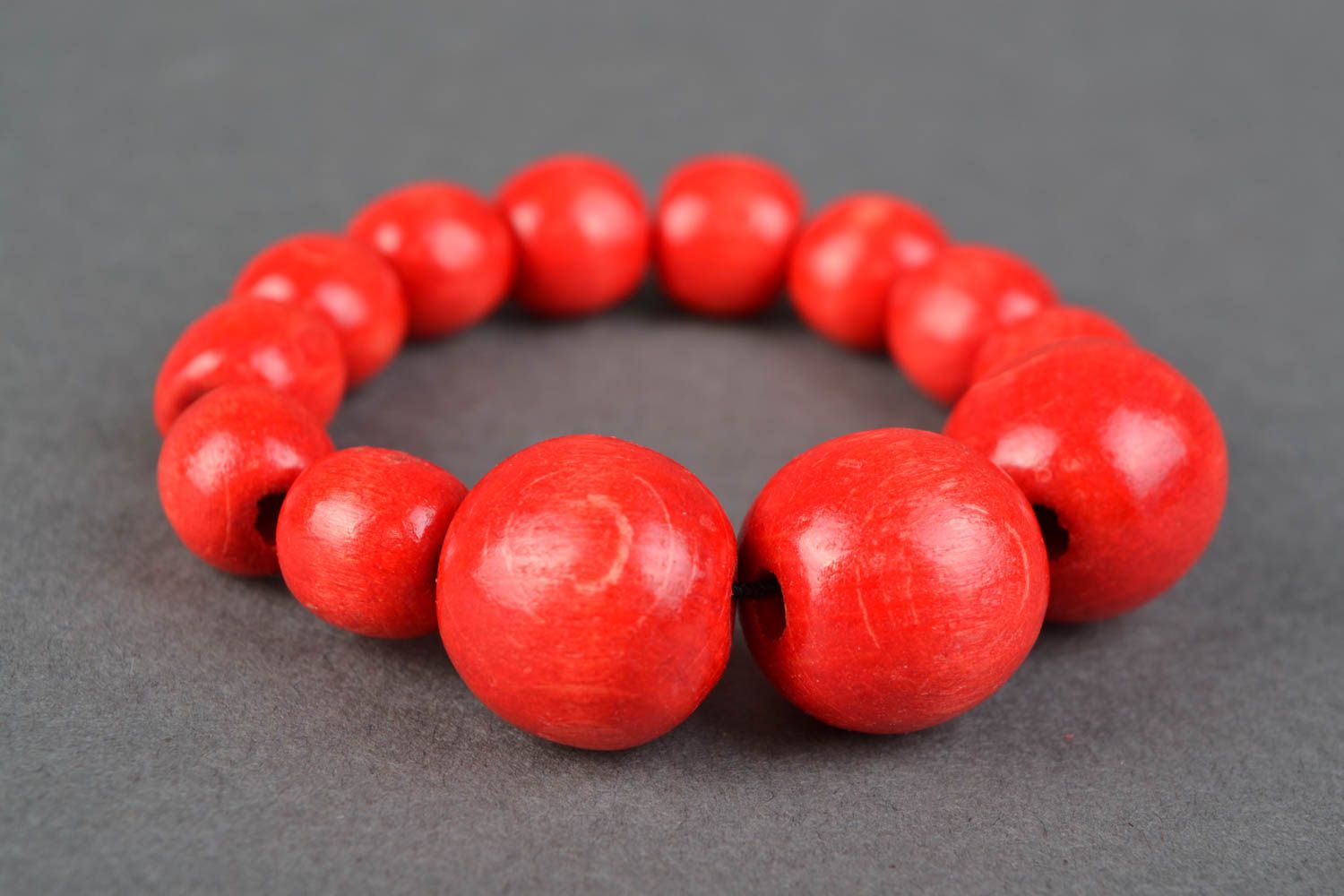 Bracelet en bois rouge sur élastique style ethnique fait main pour femme photo 1