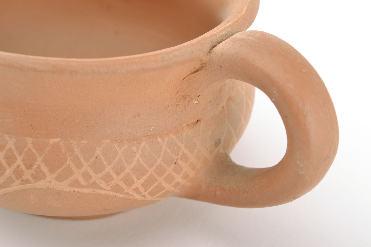 Light wide low clay not glazed coffee cup with handle and simple pattern photo 2