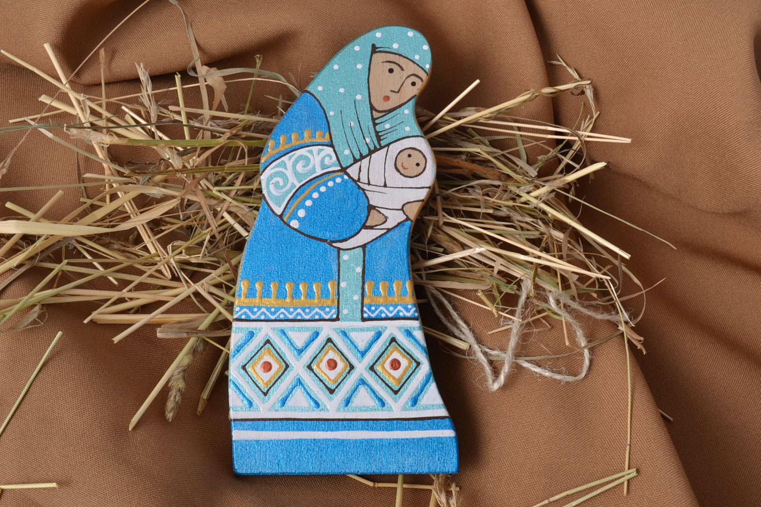 Handmade decorative Christmas flat painted wooden figurine of Maria with a baby photo 1