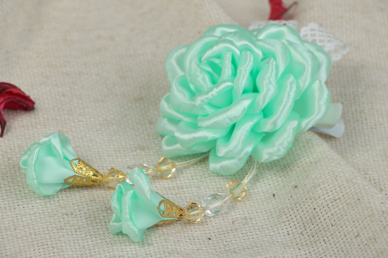 Handmade hair clip with flower made of satin ribbons of mint color and beads photo 5