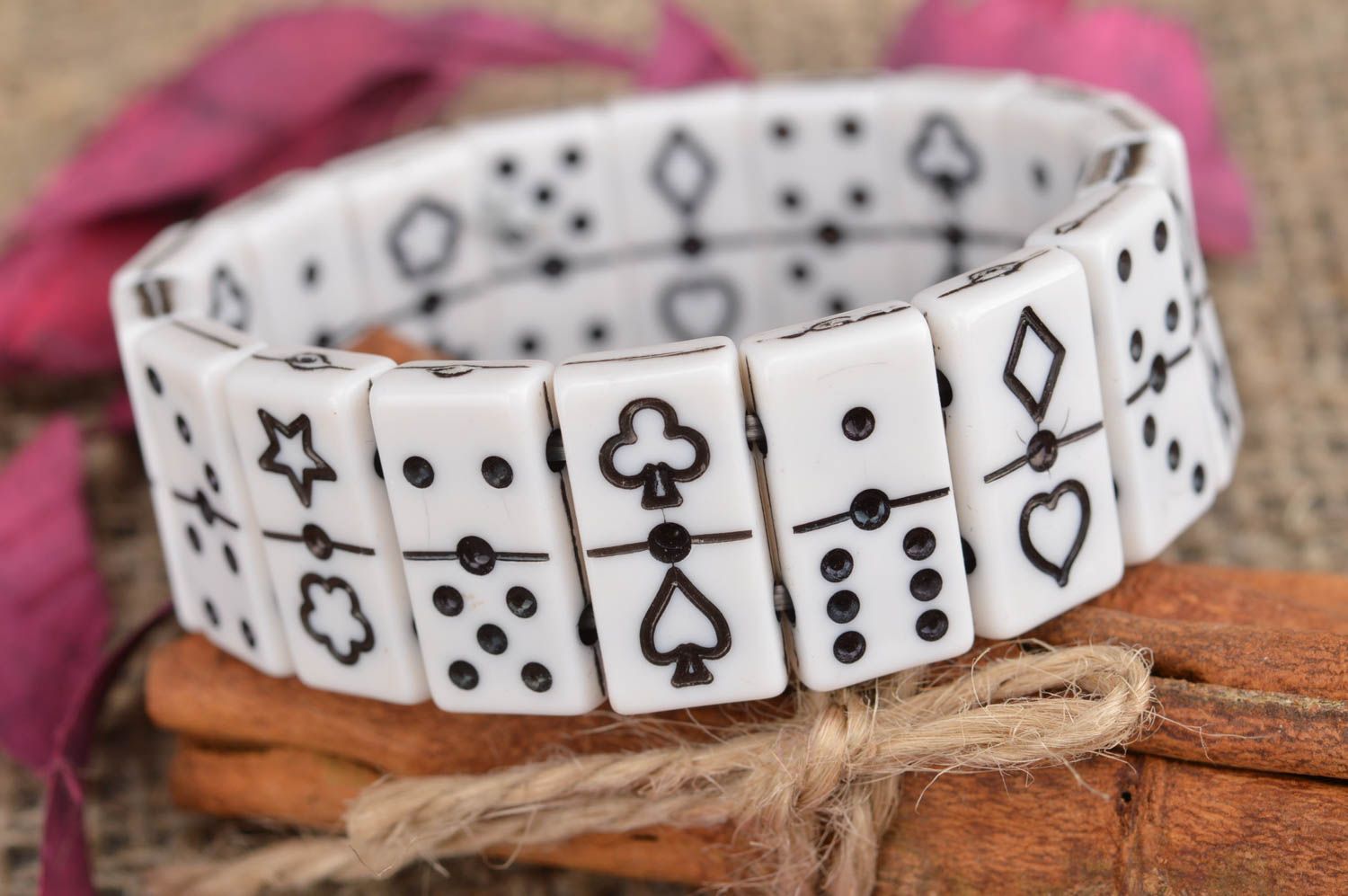 Black and white bracelet made of flat beads in shape of dominoes counters photo 1