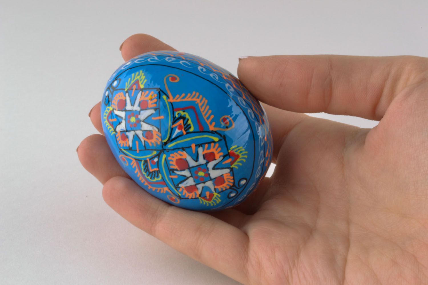 Blue Easter egg with paintings photo 5