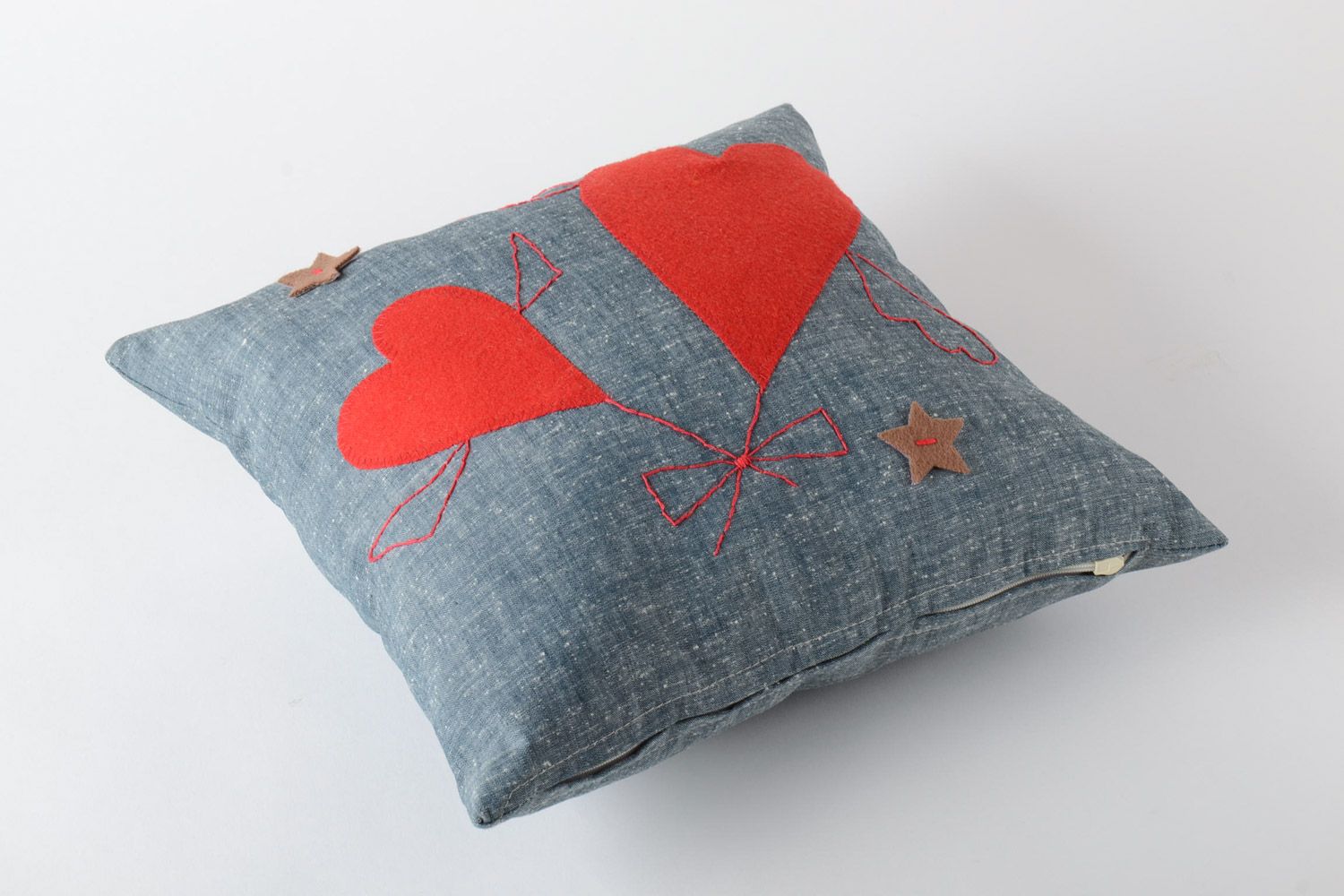 Handmade interior designer grey sofa cushion with heart-shaped applique  photo 2