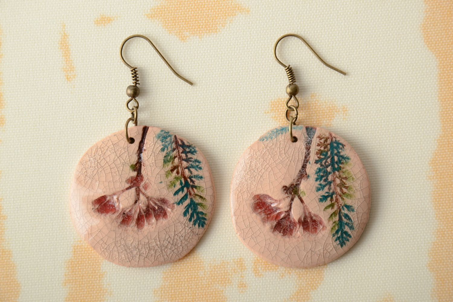 Ceramic earrings with stamp of plants photo 1
