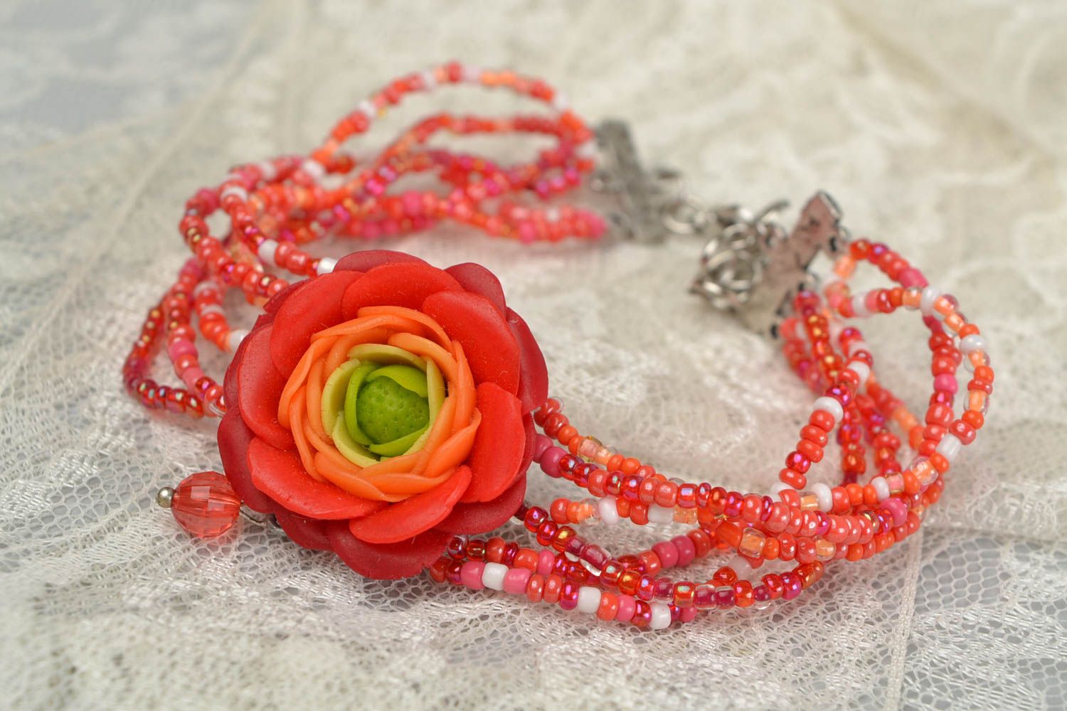 Handmade women's designer beaded wrist bracelet with red polymer clay flower photo 2