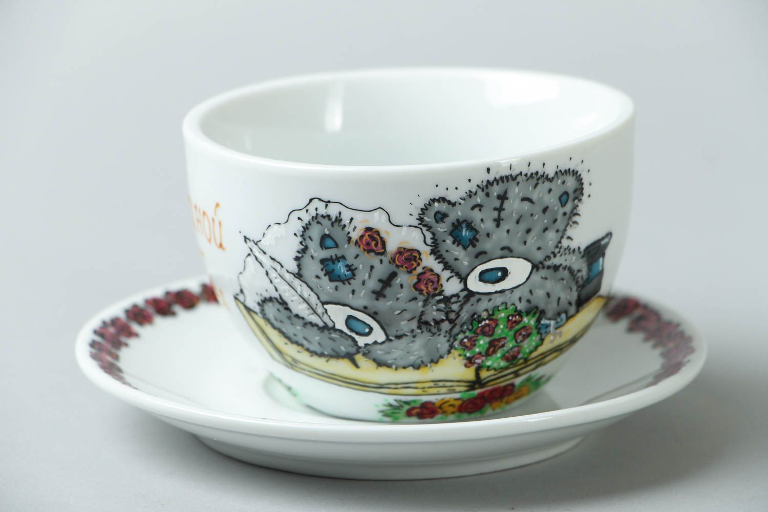 Porcelain white cup with handle, sauce, and teddy bears' pattern photo 1