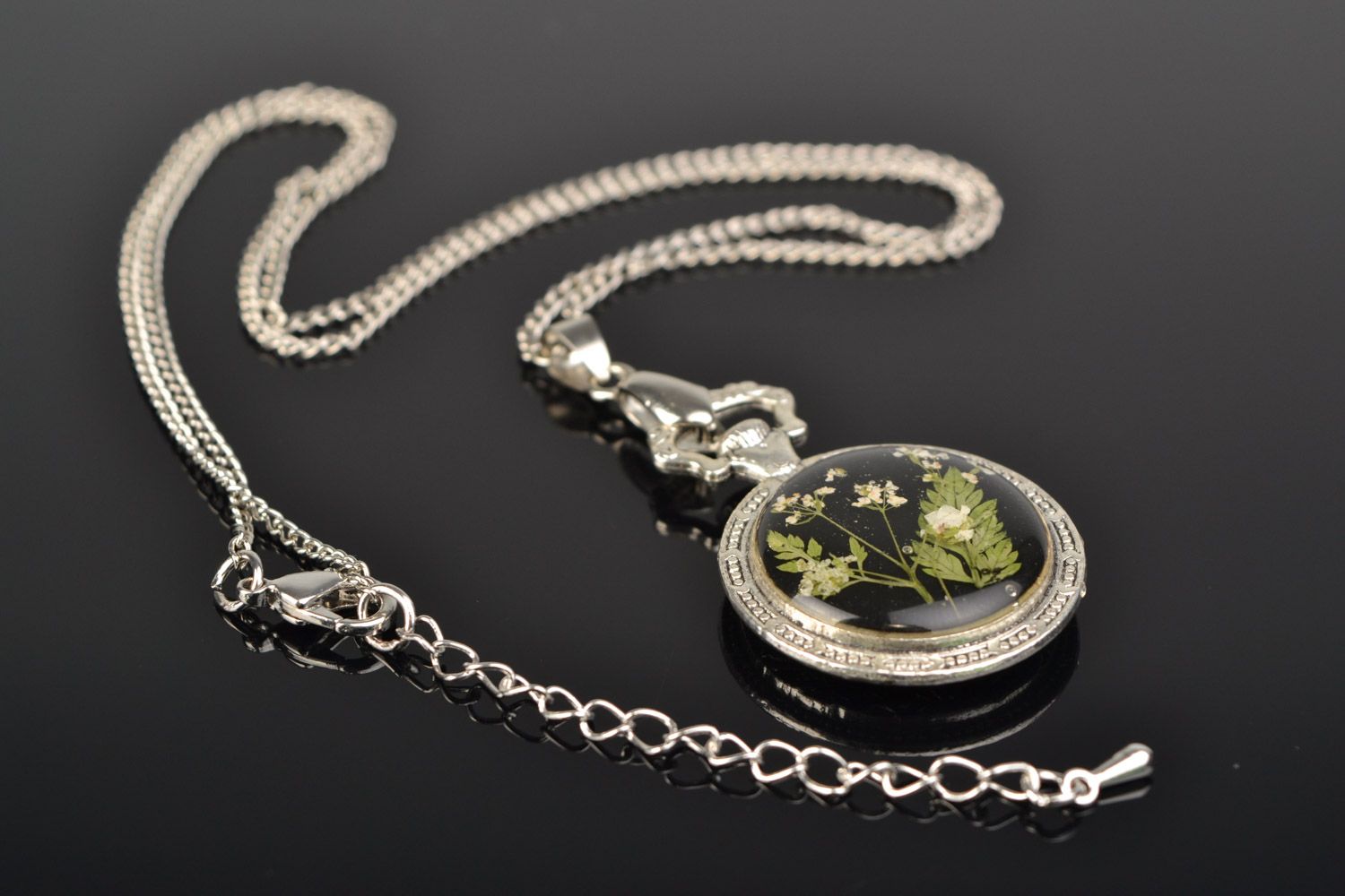 Set of handmade designer botanical pendants with real flowers coated with epoxy 2 items photo 2