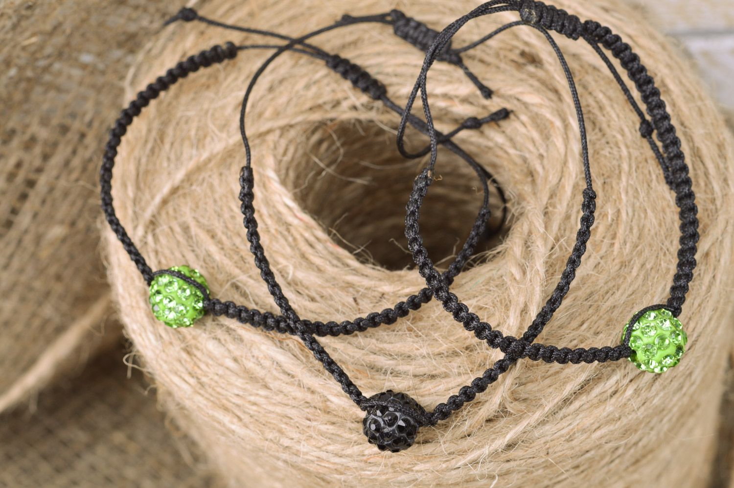 Set of handmade textile bracelets woven of threads and beads 3 items Black and Green photo 1