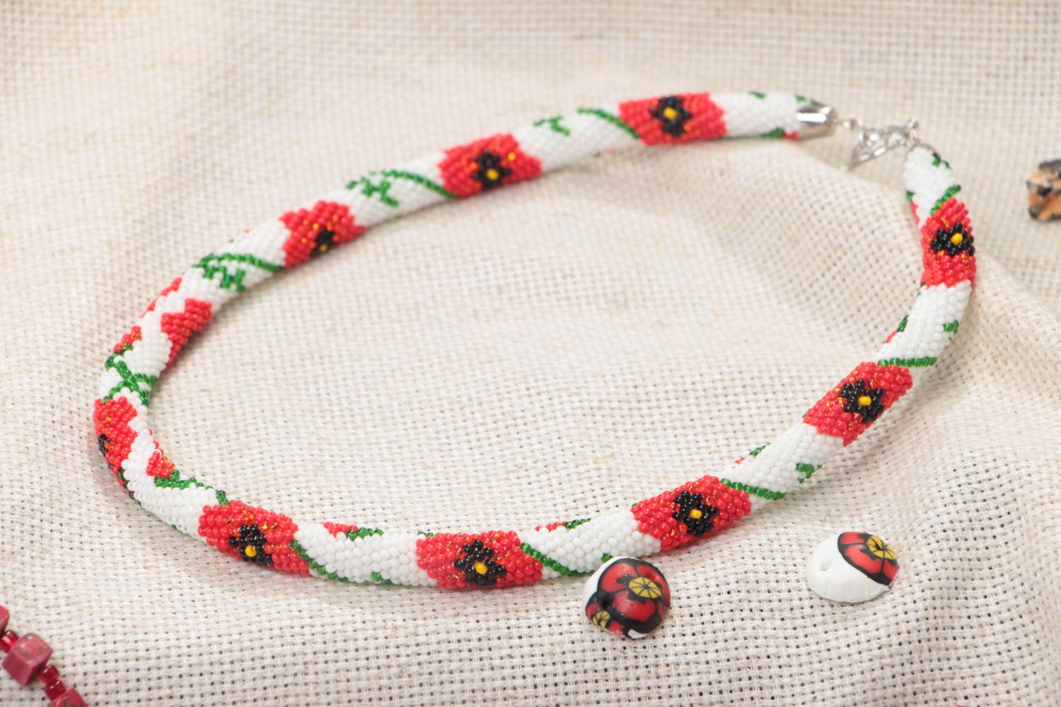 Handmade white beaded cord necklace with bright floral ornament in ethnic style photo 1