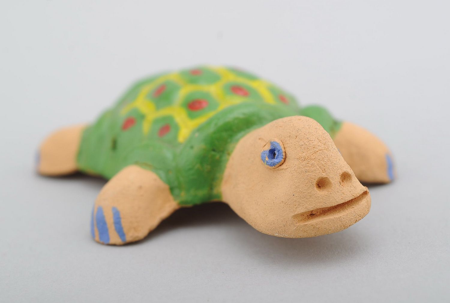 Apito artesanal em forma de uma tartaruga foto 4