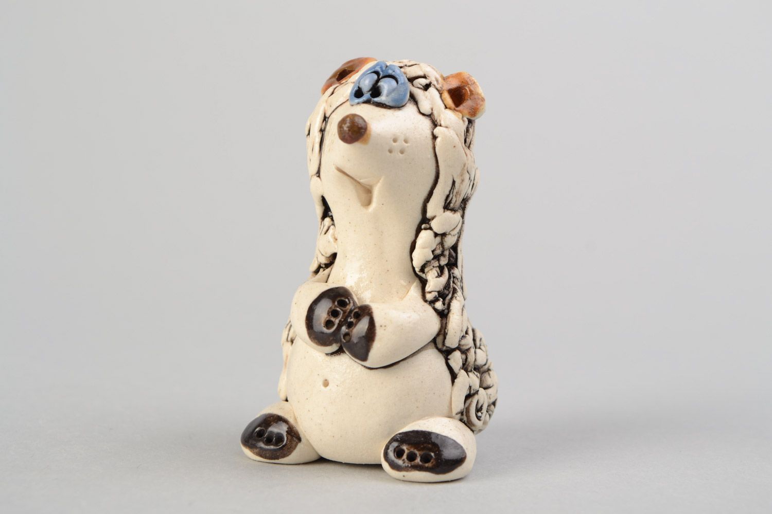 Handmade decorative miniature ceramic figurine of hedgehog with mushroom photo 1