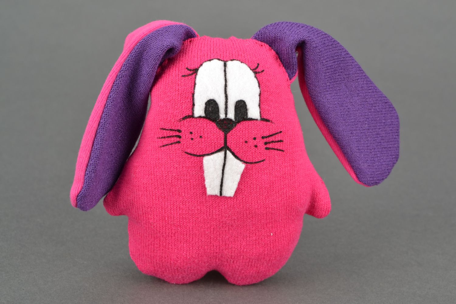 Small pink soft toy hare photo 3