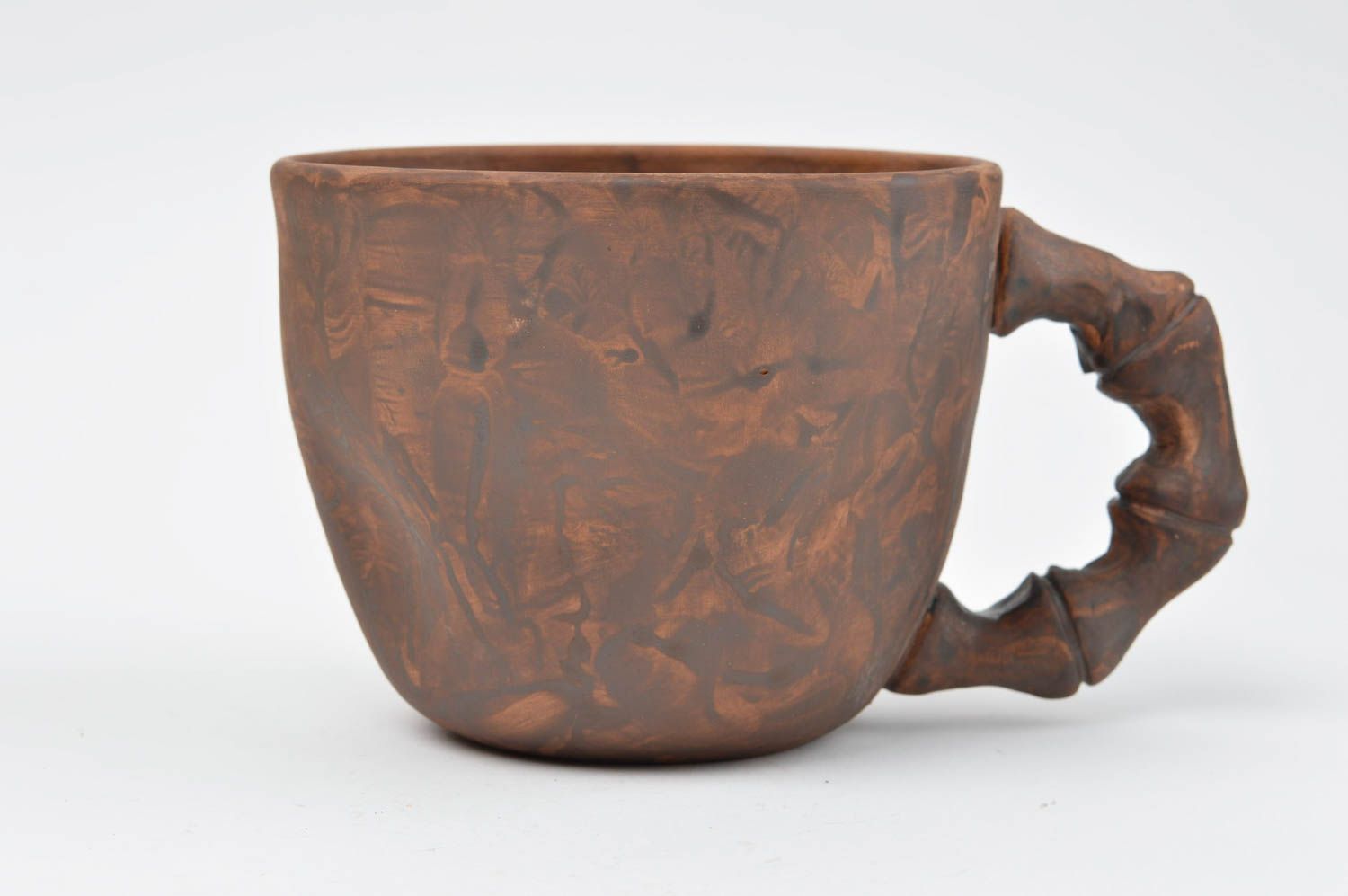 Brown clay cup with bone-shaped handle not glazed and without a pattern
 photo 2