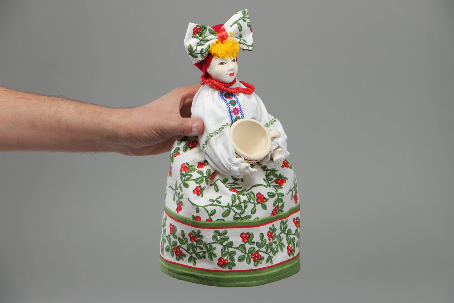 Handmade teapot cozy in the shape of a doll with ceramic face in Ukrainian style photo 4