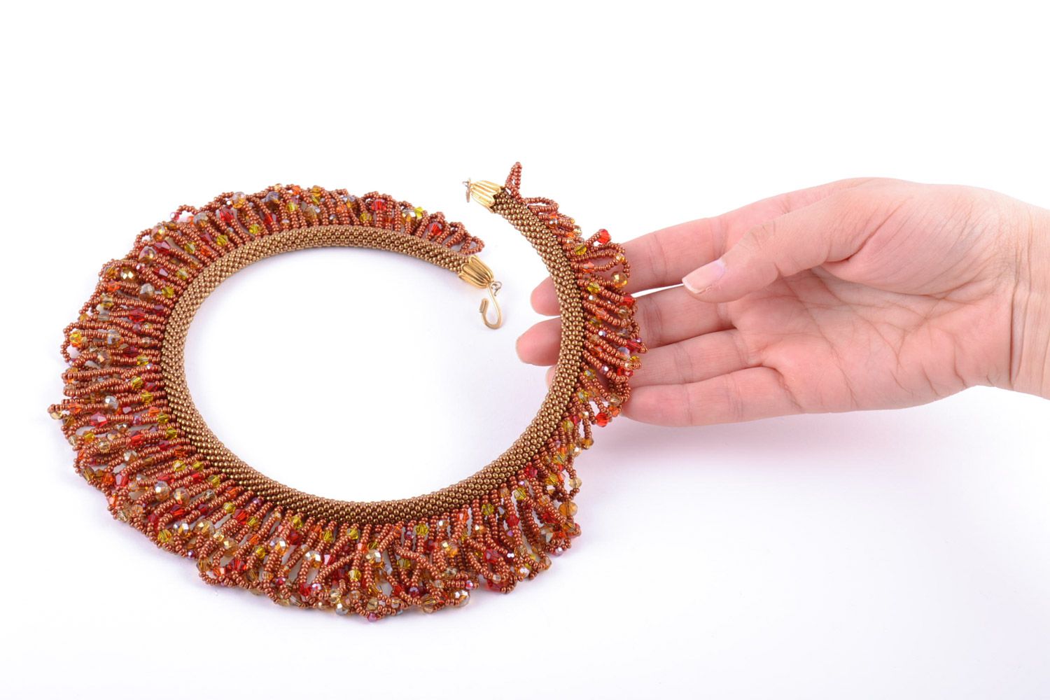 Massive handmade necklace woven of beads with fringe in warm color palette photo 2