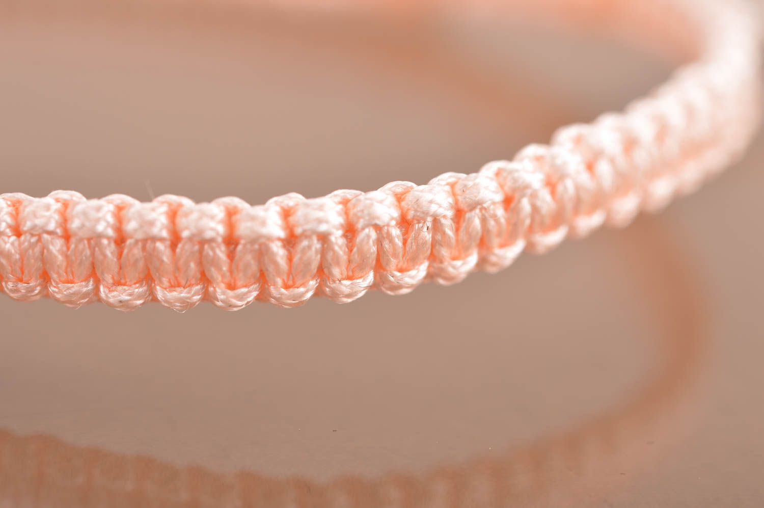 Handmade stylish thin pink woven wrist bracelet made of silk with insert photo 4