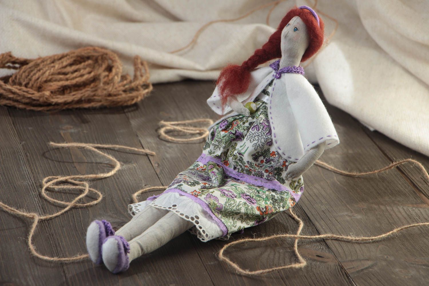 Handmade designer cotton and linen fabric soft doll in dress with floral pattern photo 1