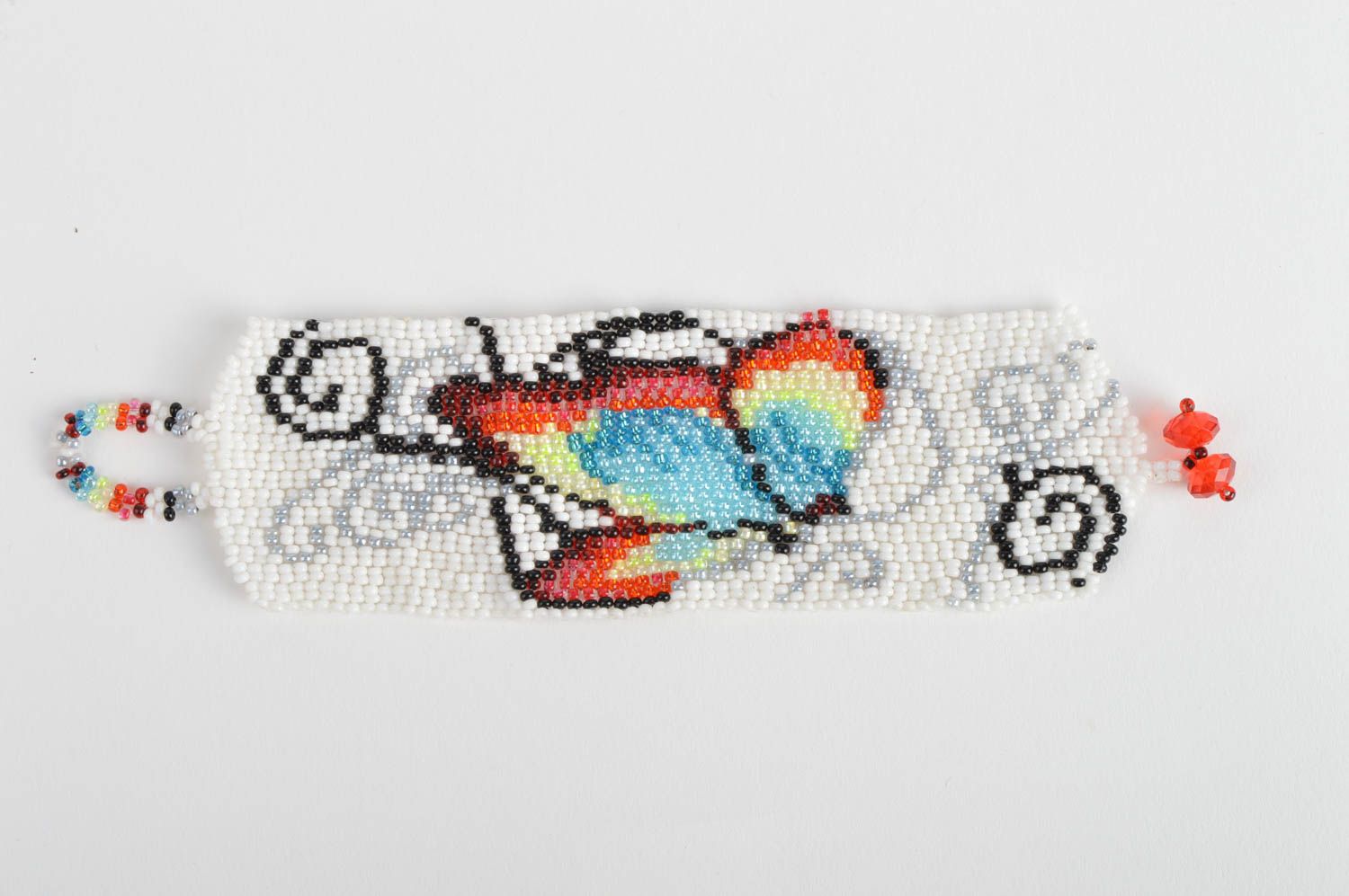 Bracelet en perles de rocaille blanc image de papillon multicolore fait main photo 2