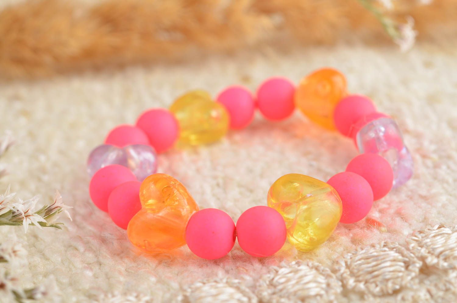 Pink kids beaded bracelet on elastic string with yellow heart-shaped bead photo 1