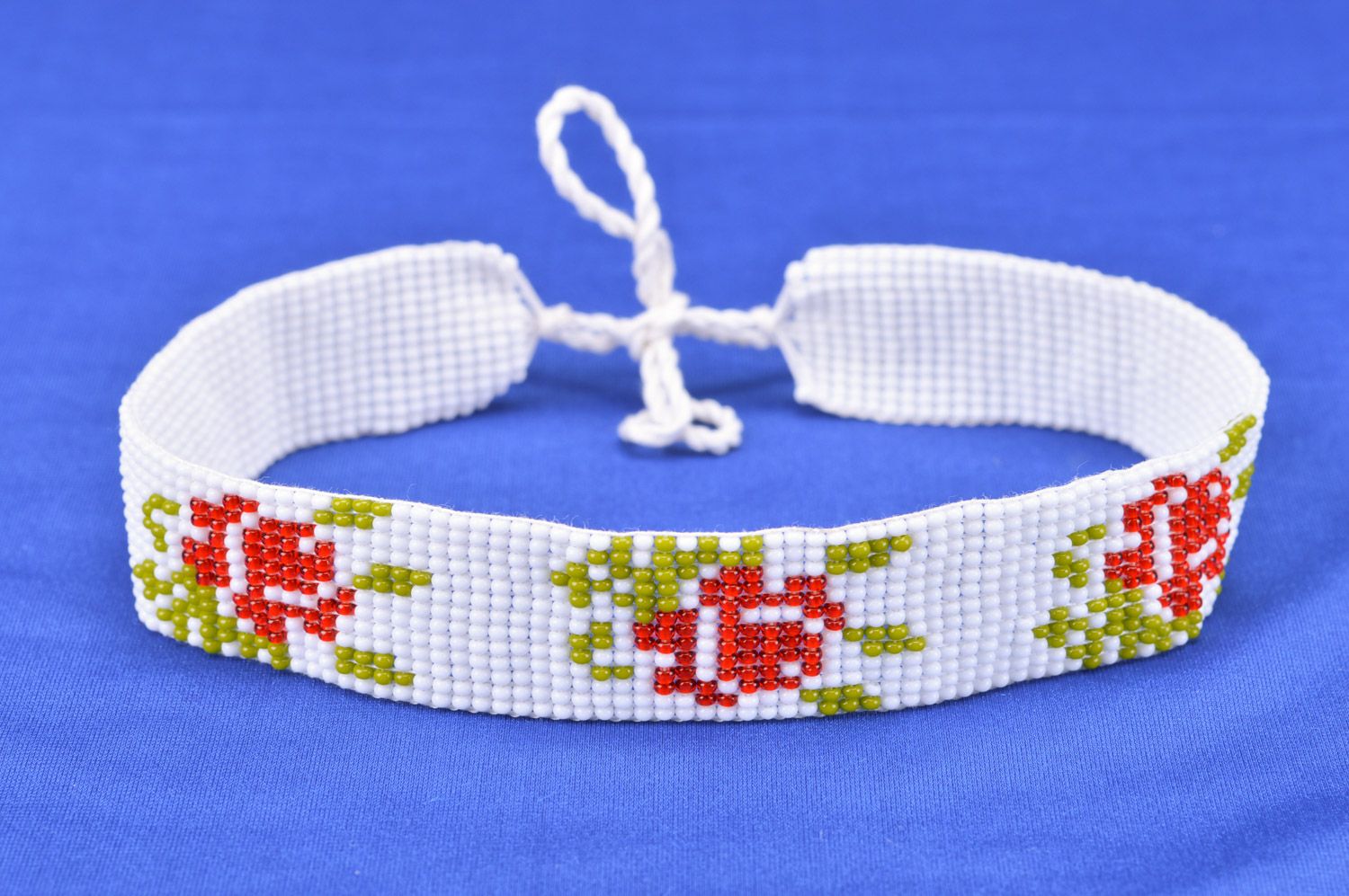 Handmade white collar necklace woven of Czech beads with flower ornament on ties photo 2