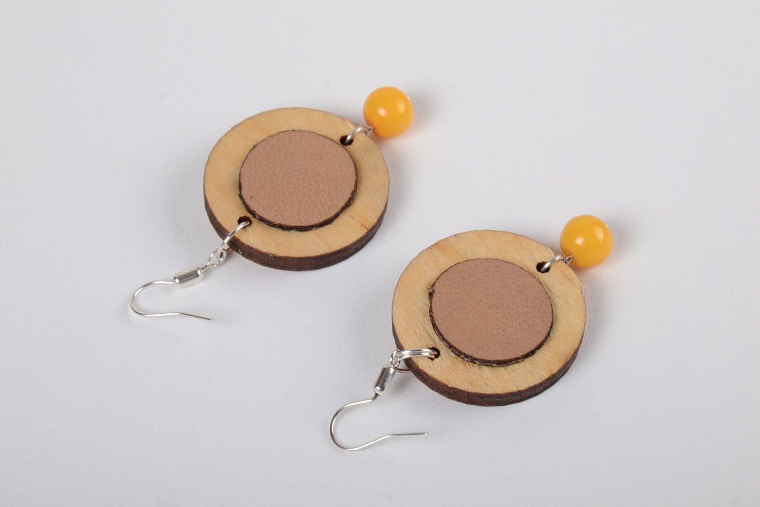 Handmade round plywood earrings with cross-stitch embroidery in eco style photo 3