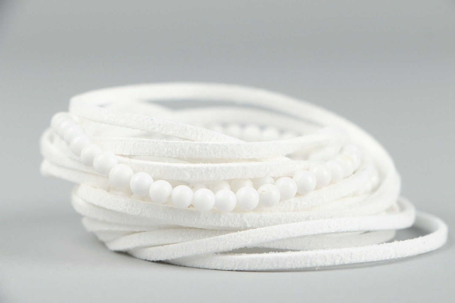 White suede bracelet for attraction of love photo 1