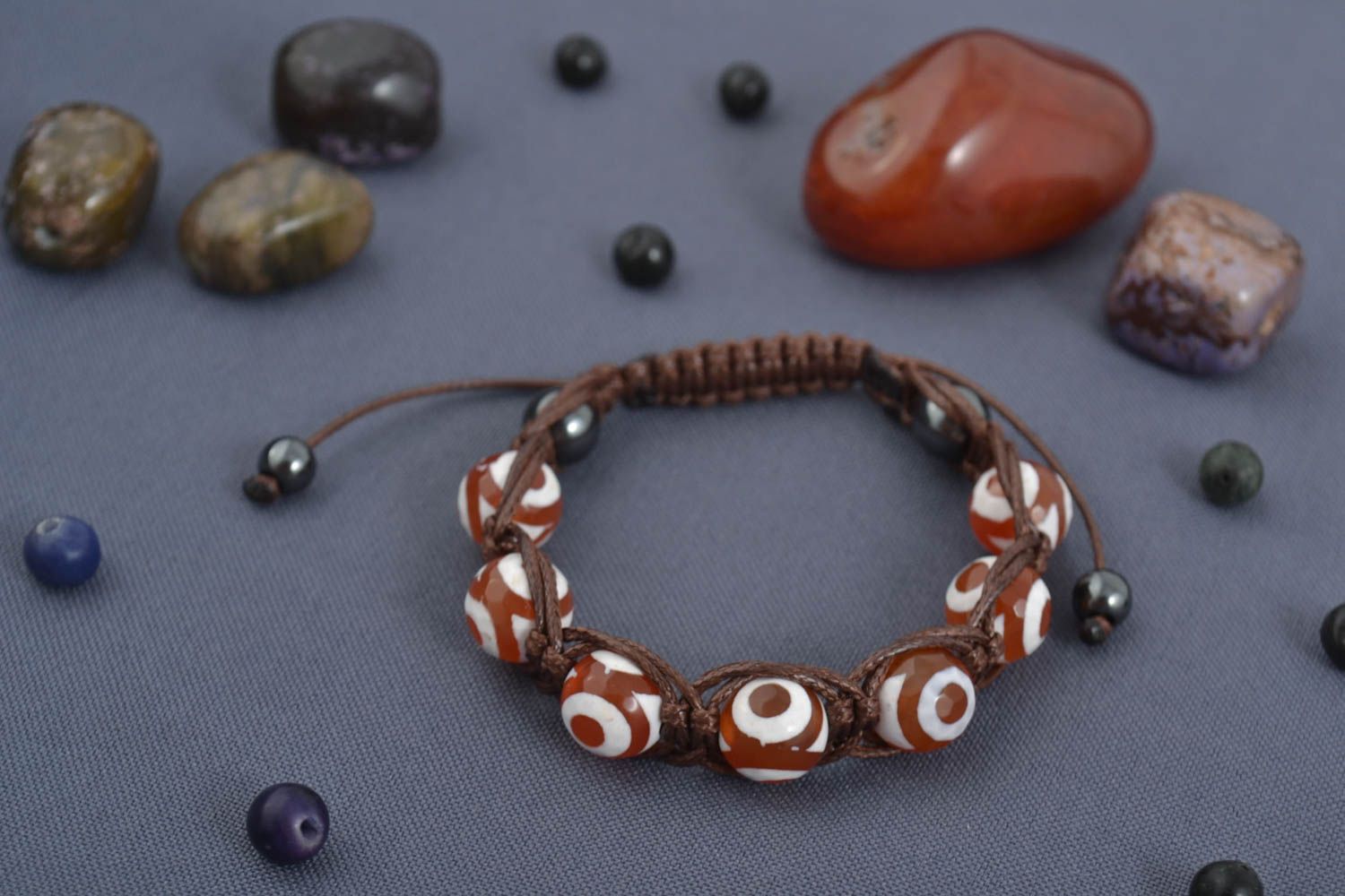 Strand beaded gemstone hematite and agate bracelet on brown cord photo 1