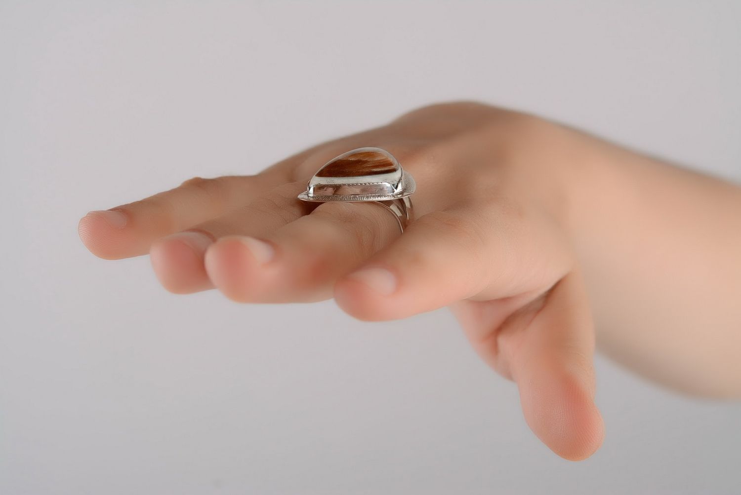 Silver ring with a cow horn photo 3