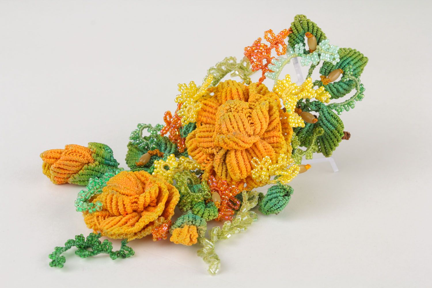 Brooch made of threads and beads  photo 2