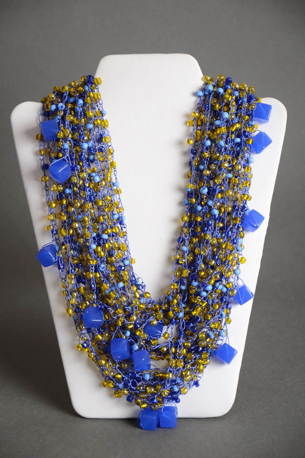 Handmade designer long airy crocheted beaded necklace with blue plastic beads photo 2
