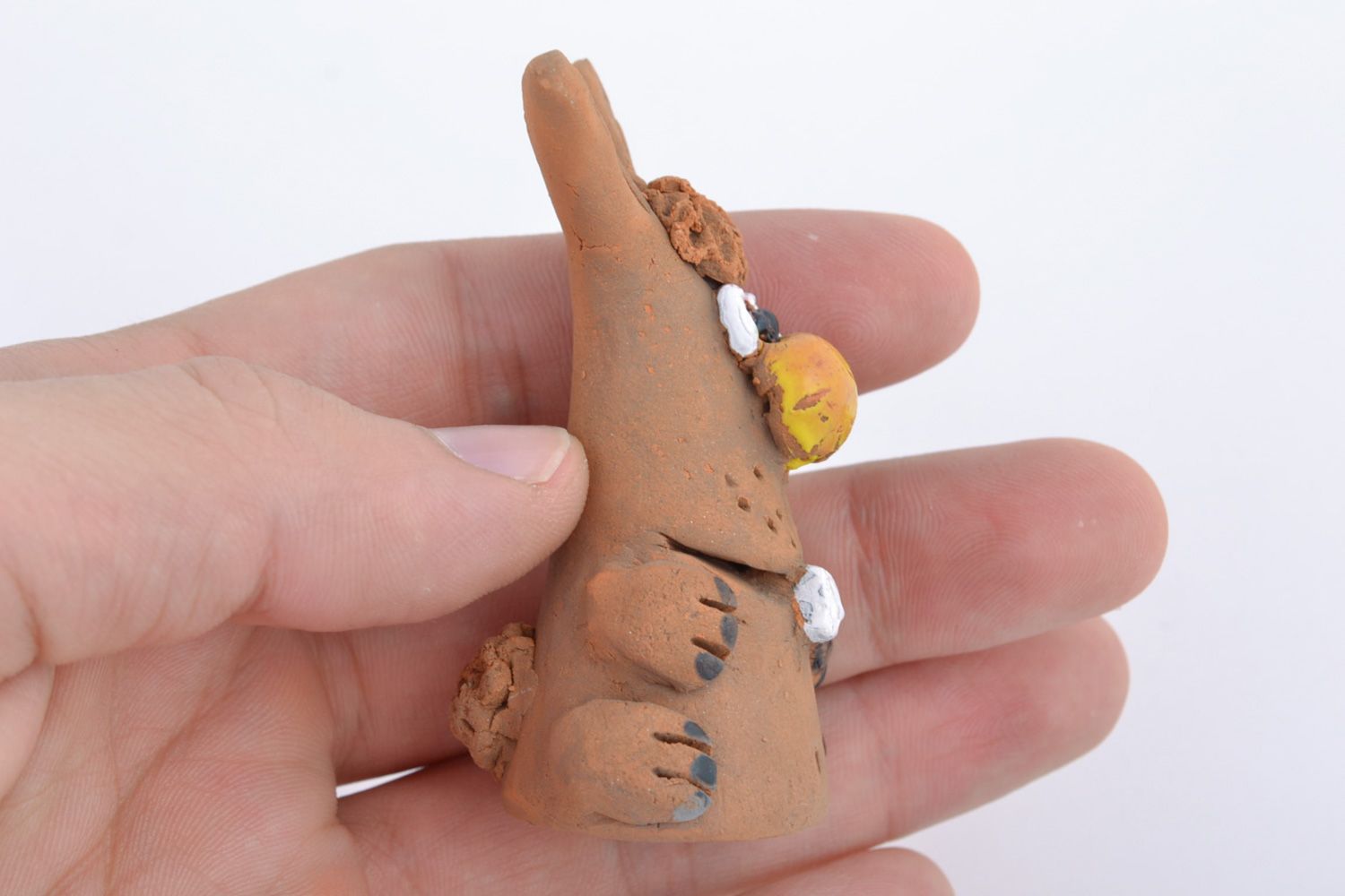 Small funny handmade ceramic figurine of rabbit coated with glaze for present photo 2