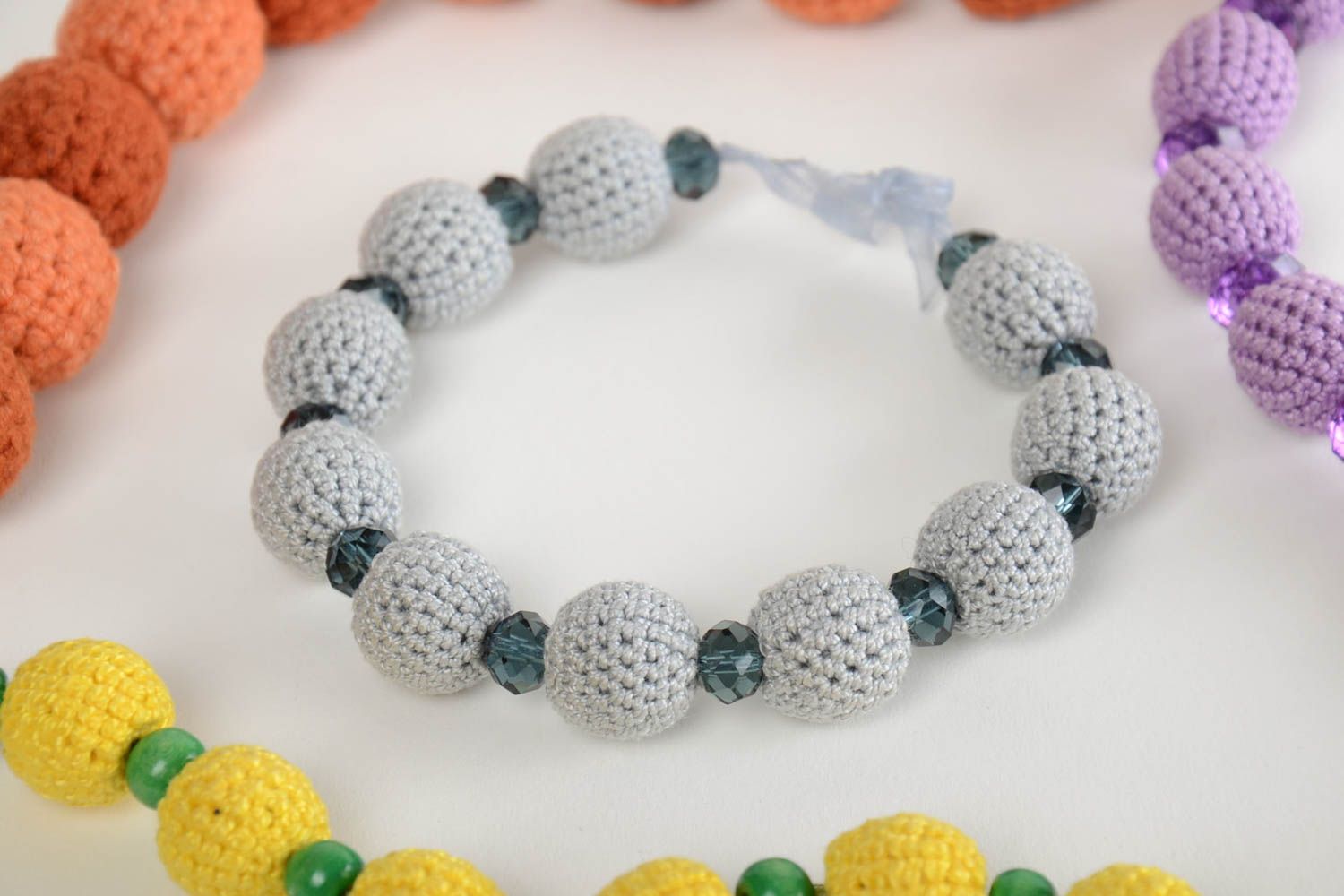 Beautiful handmade designer crochet ball bracelet of gray color photo 1