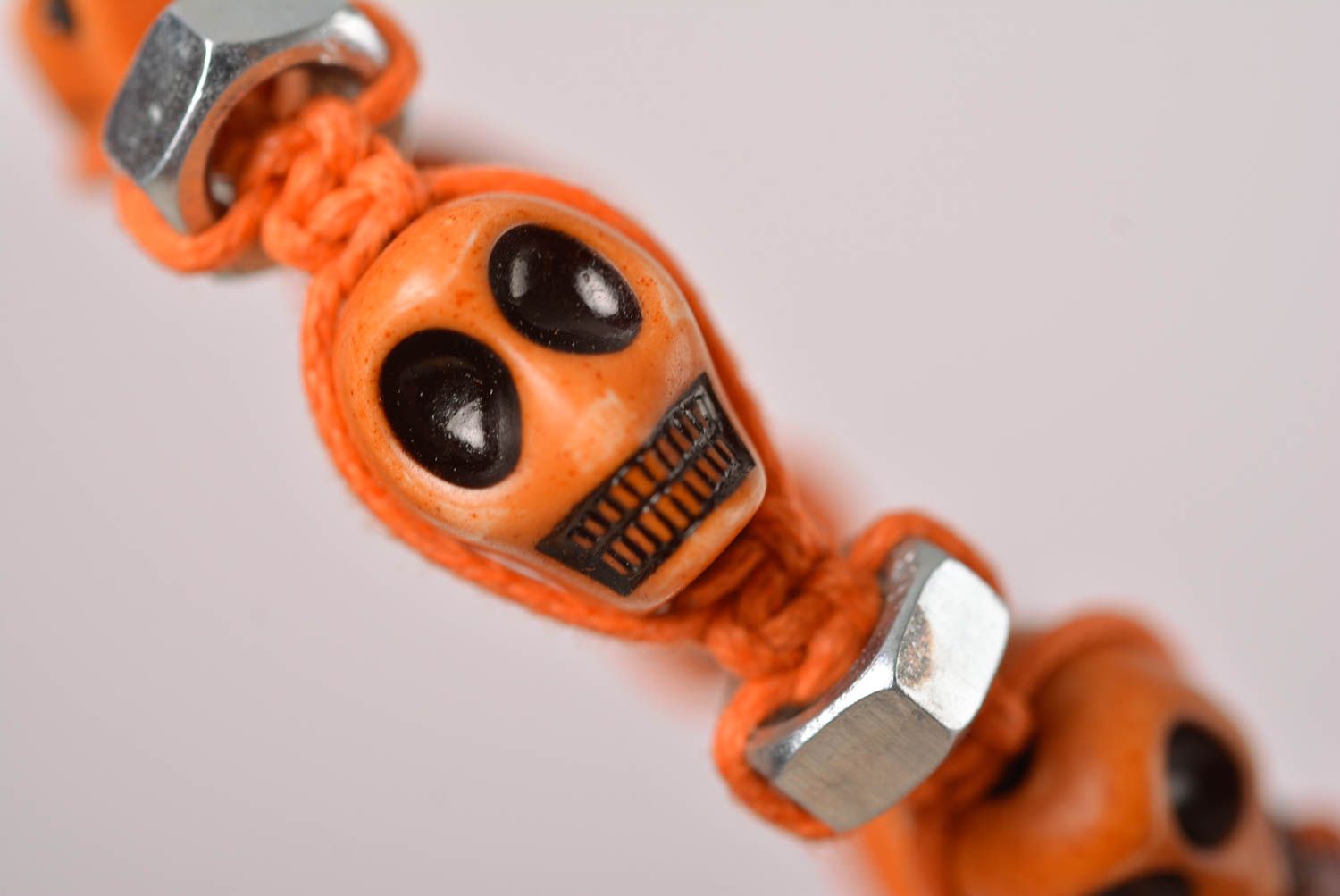 Handmade orange skull beaded orange cord bracelet with female screws photo 5