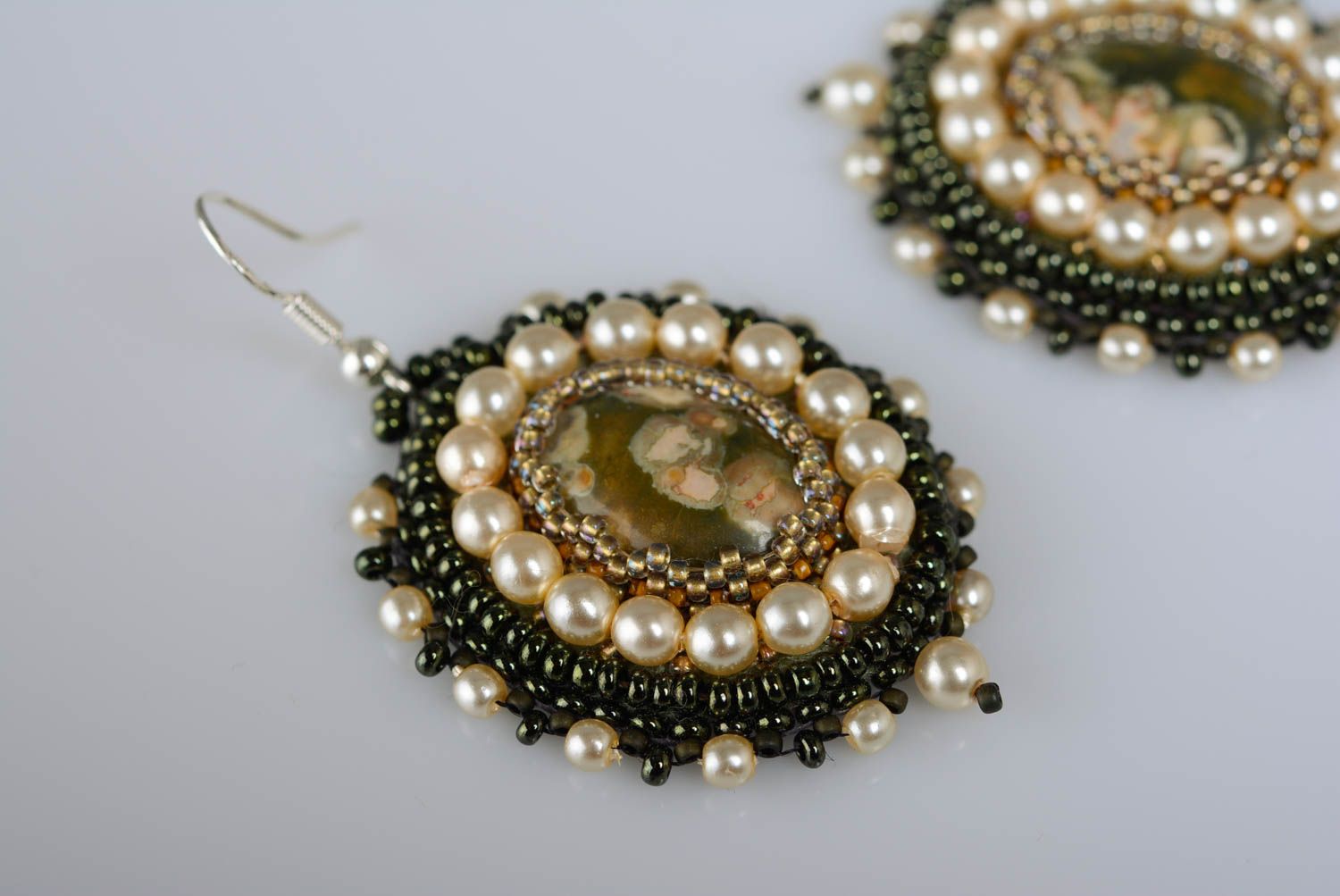 Handmade oval shaped festive dangling earrings embroidered with beads and jasper photo 2