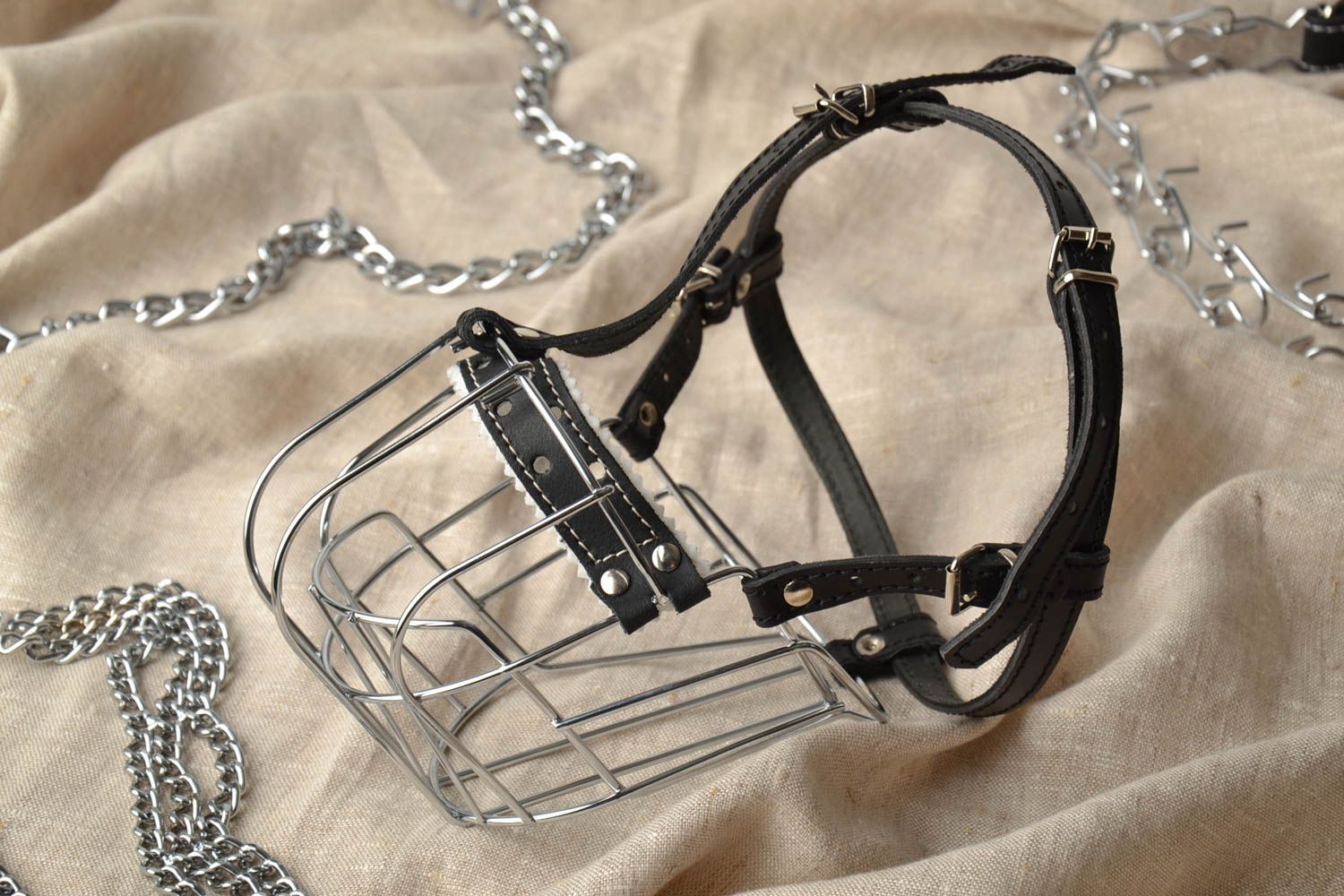 Metal dog muzzle with leather straps photo 1