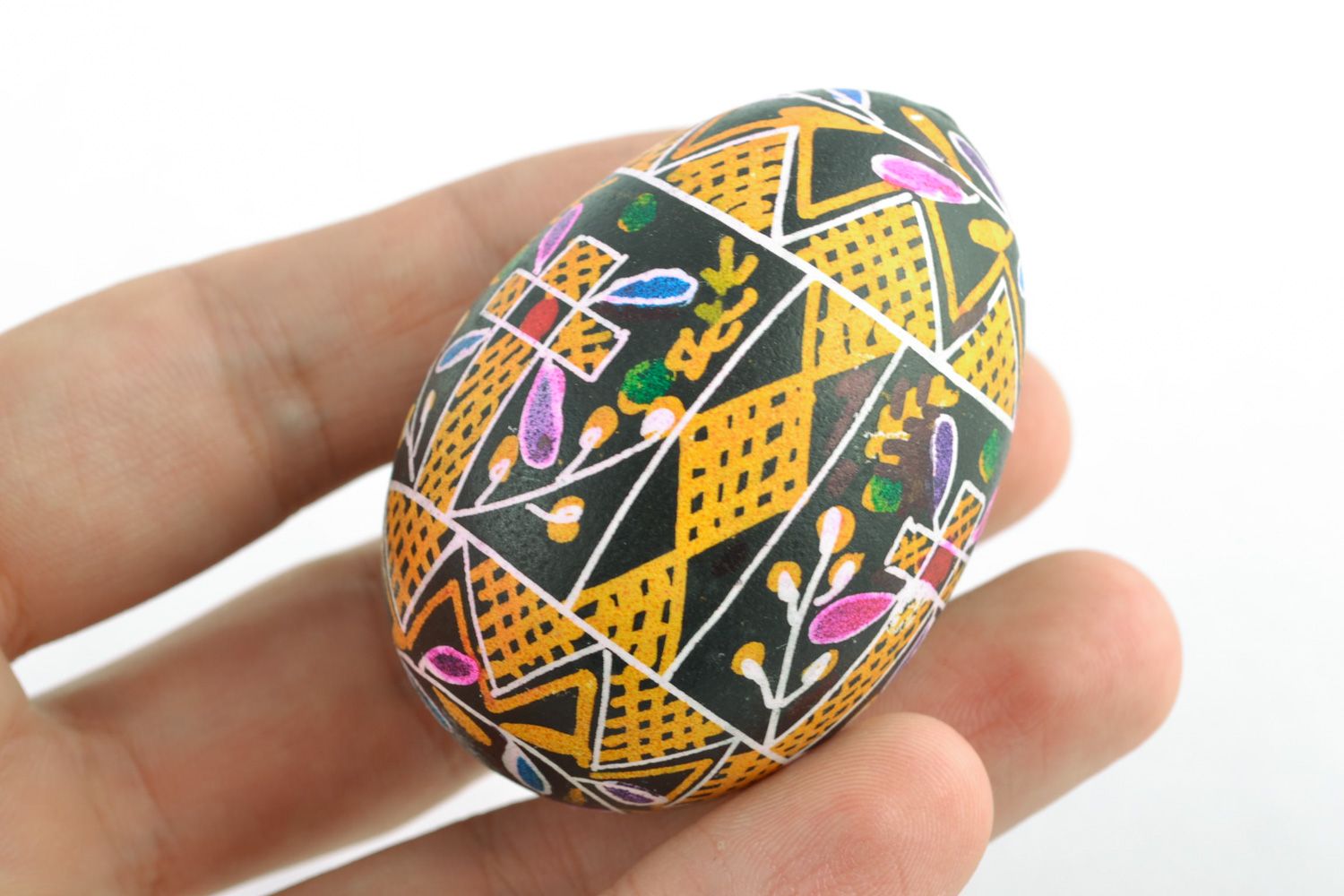 Handmade painted Easter egg pysanka with rich ornament made with hot wax  photo 2