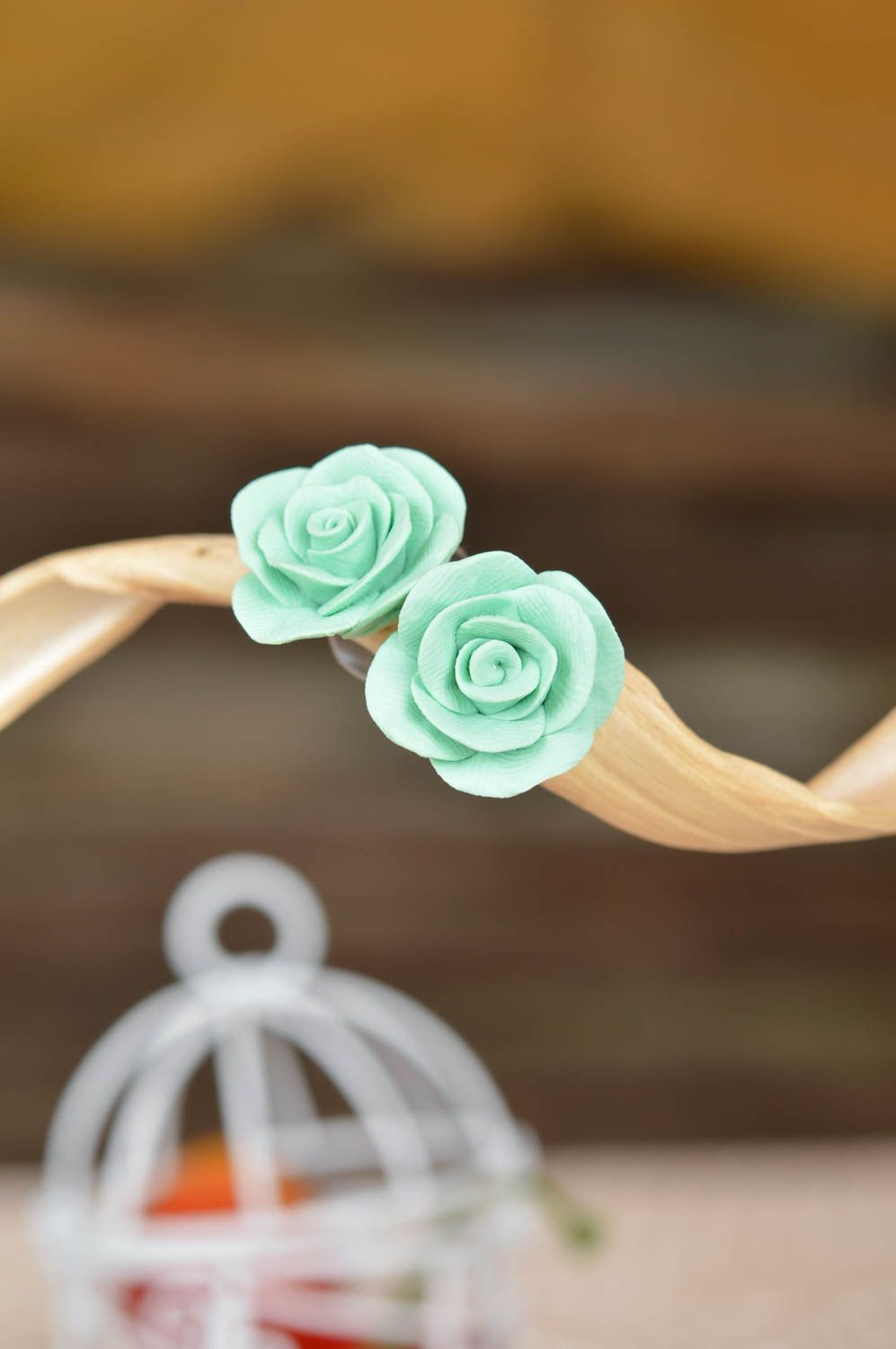 Beautiful handmade molded polymer clay flower stud earrings of mint color photo 1