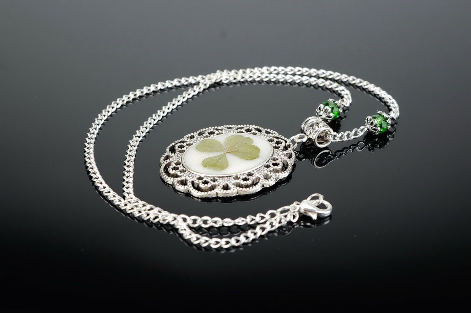 Pendant with a natural four-leaf clover photo 2
