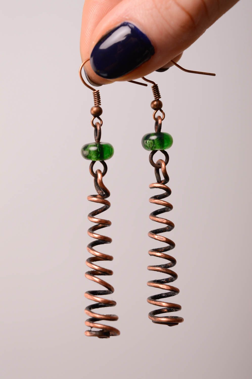 Long spiral copper earrings photo 5