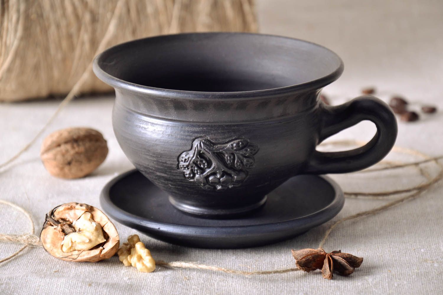 Smoked black clay glazed coffee cup with handle and saucer and grapes' pattern photo 2
