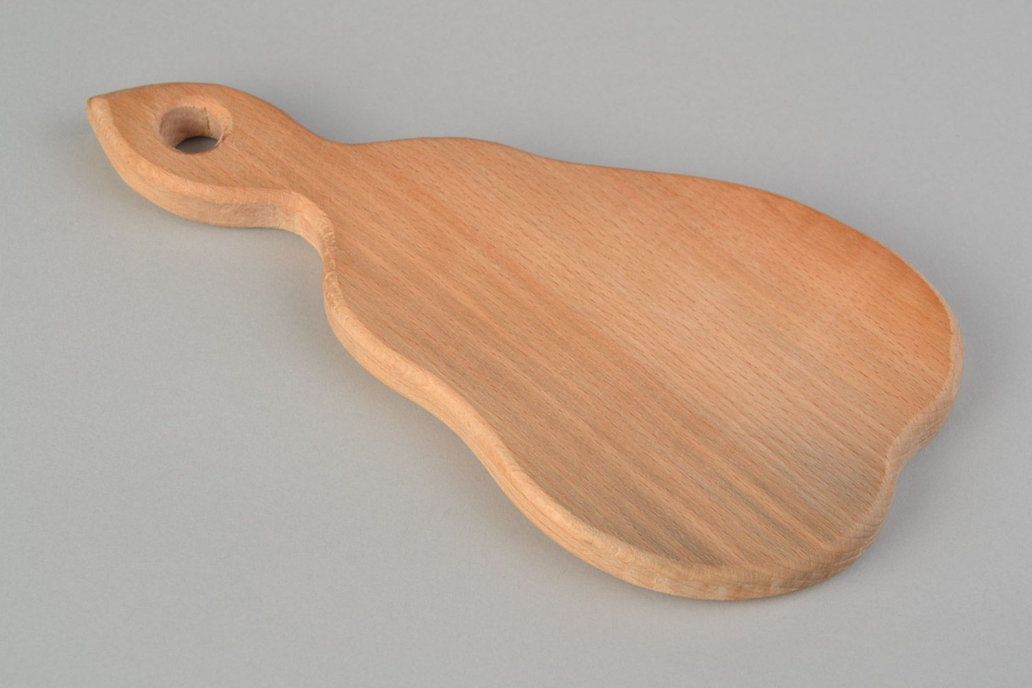 Pear shaped handmade decorative wooden chopping board with Petrikivka painting photo 4