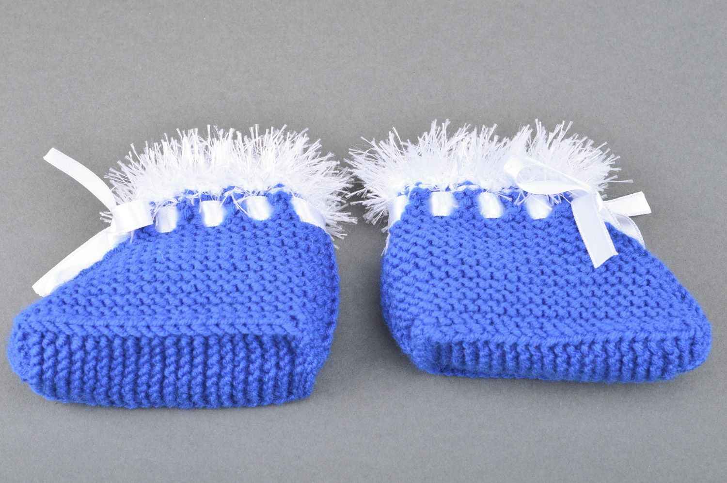 Beautiful warm handmade knitted half-woolen baby booties of blue color photo 2