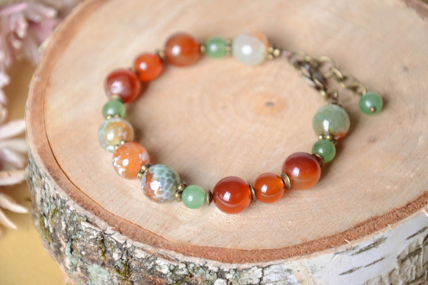 Stylish handmade gemstone beaded adjustable bracelet in pale green and orange color photo 1