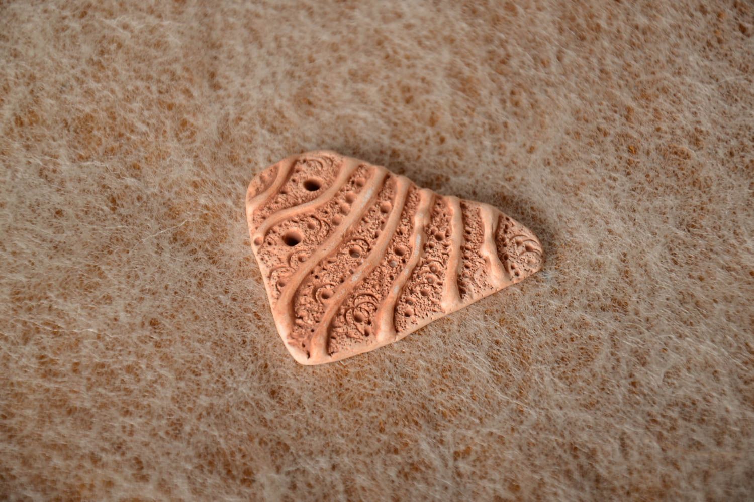 Homemade designer ceramic pendant of unusual shape for creative work photo 1