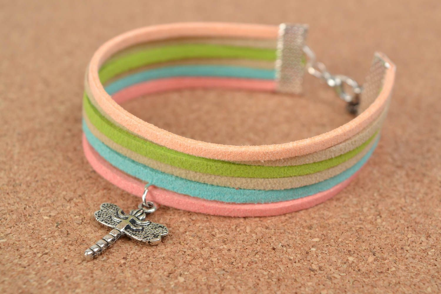 Colorful handmade woven suede bracelet with metal charm in the shape of dragonfly photo 1