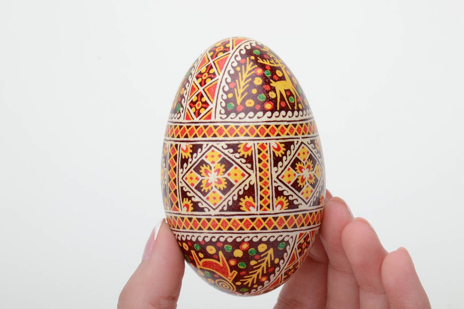 Handmade colorful decorative Easter pysanka goose egg with wax painting photo 5