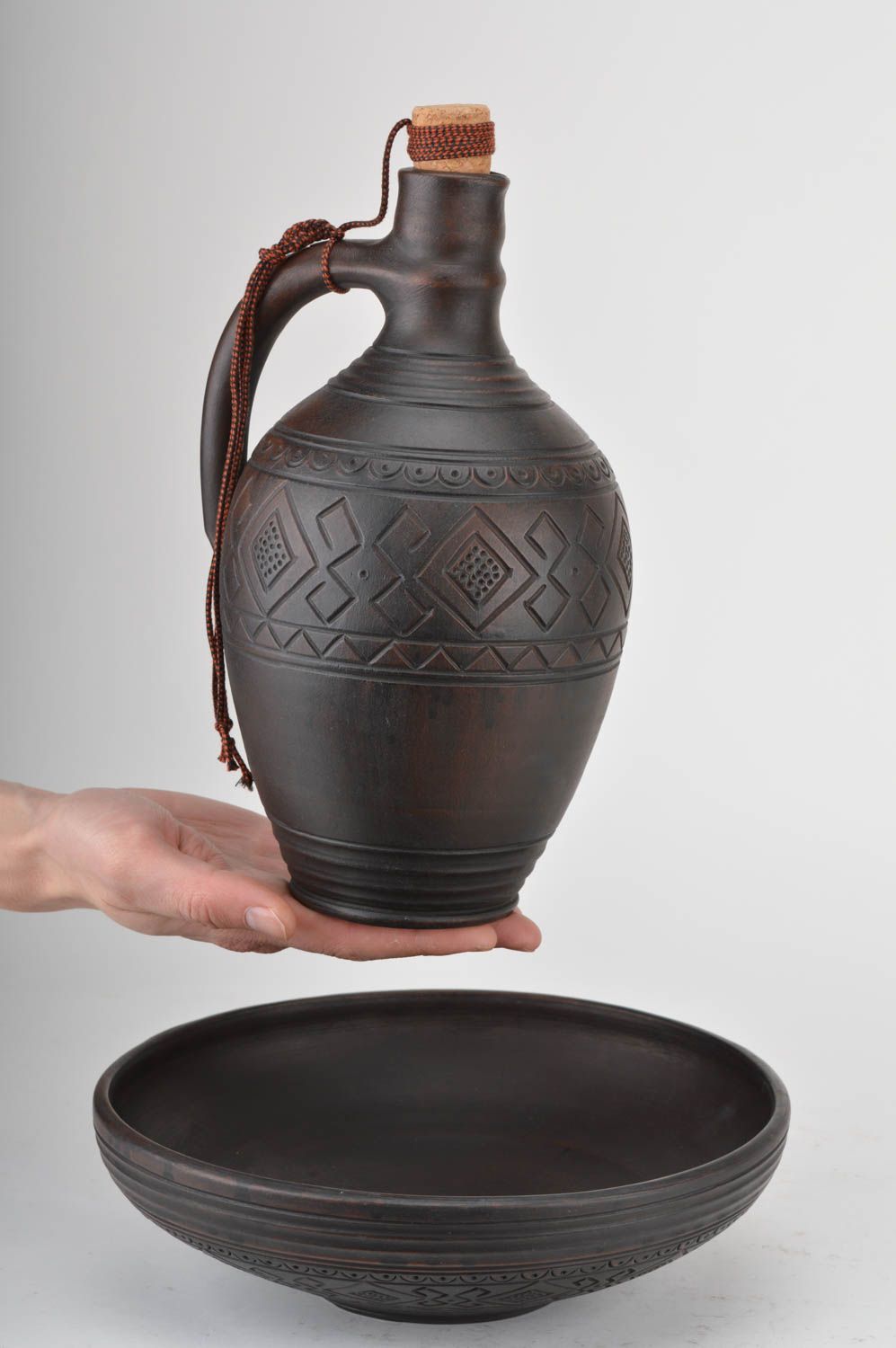 Set of handmade pottery kitchenware dark ceramic bottle with cork and fruit bowl photo 3
