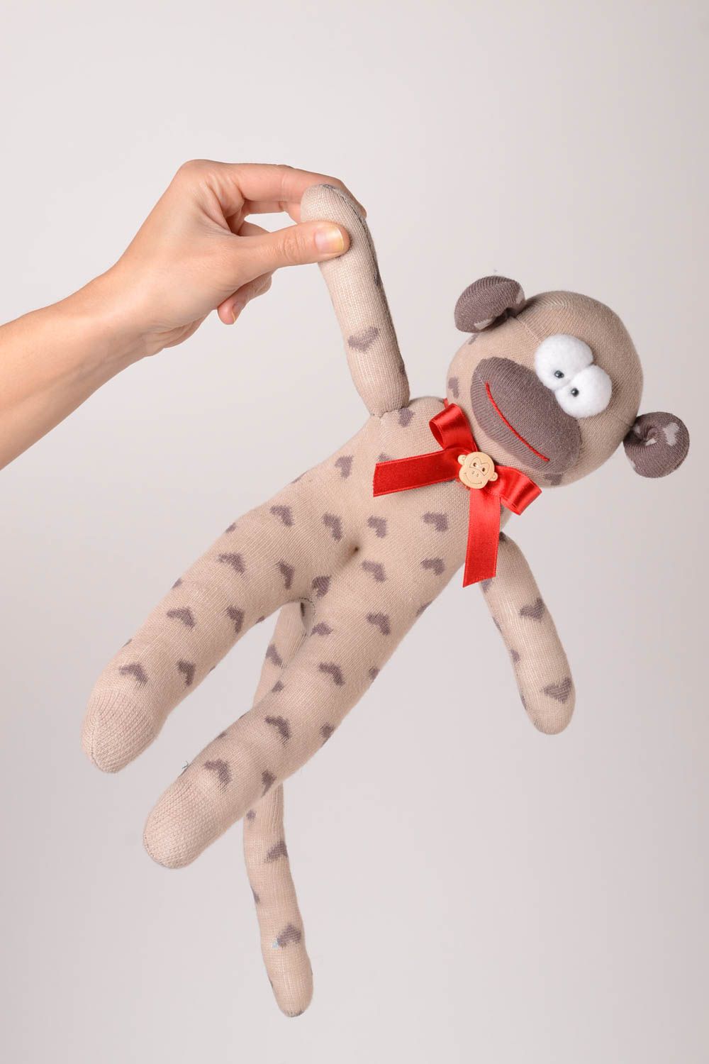 Giocattolo morbido fatto a mano pupazzo da bambini a forma di scimmia grigia foto 2